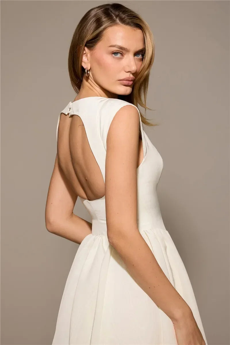 Vestido Elegante con Manga Capa y Espalda Descubierta