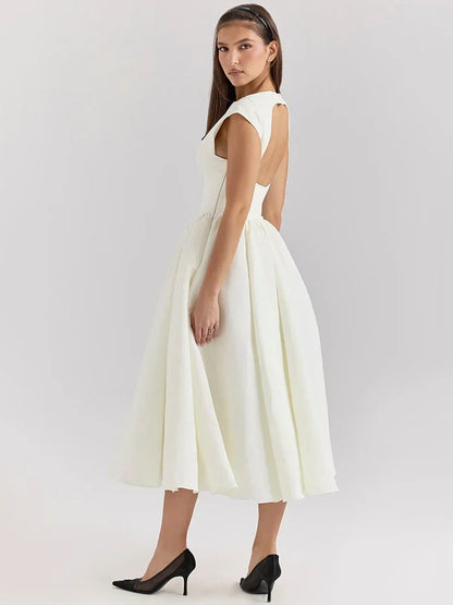 Vestido Elegante con Manga Capa y Espalda Descubierta