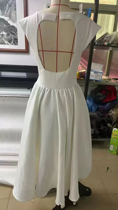 Vestido Elegante con Manga Capa y Espalda Descubierta
