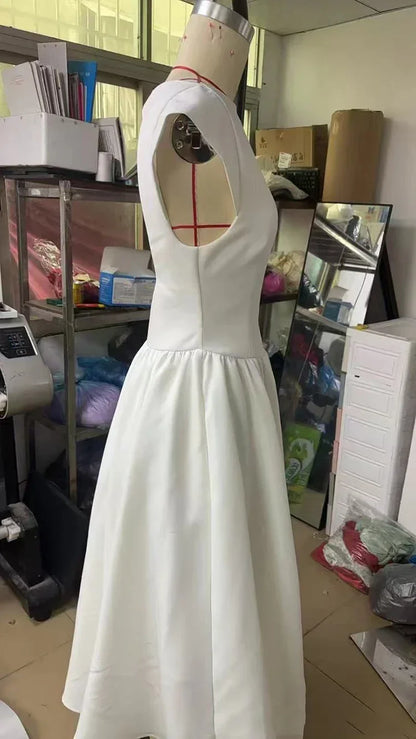 Vestido Elegante con Manga Capa y Espalda Descubierta