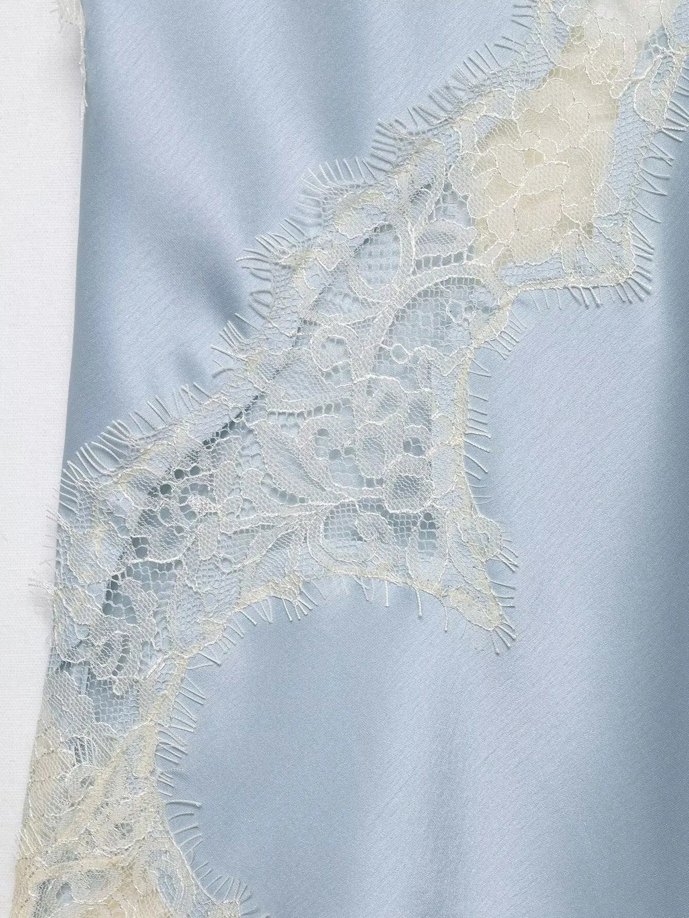 Lace-paneled camisole tops
