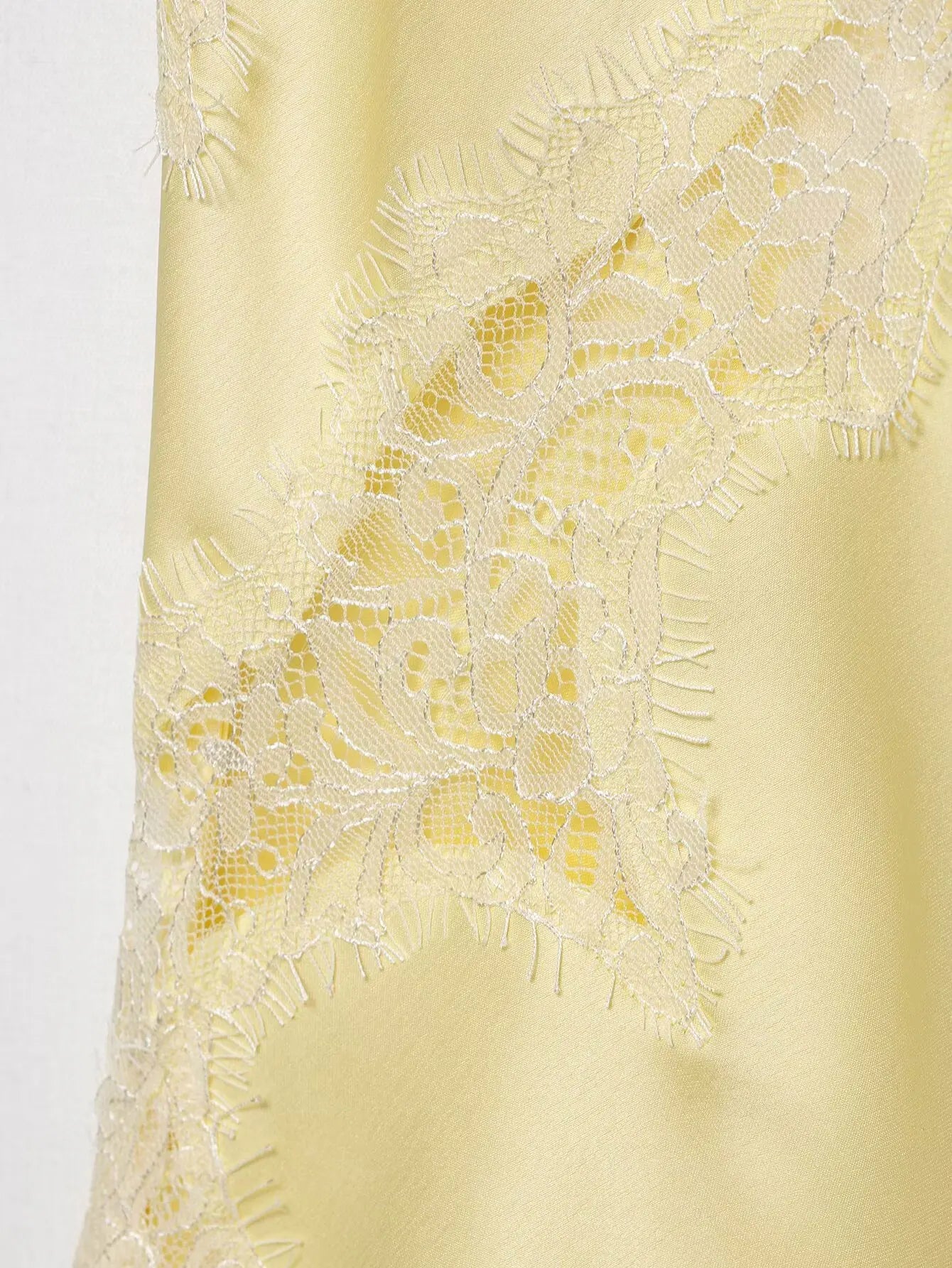 Lace-paneled camisole tops