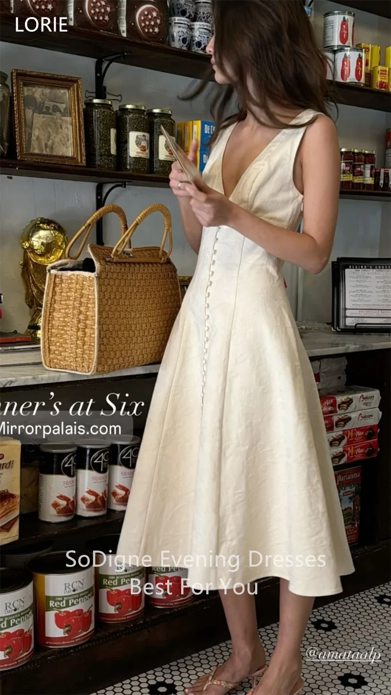 vestidos de novia con botones y cuello en V