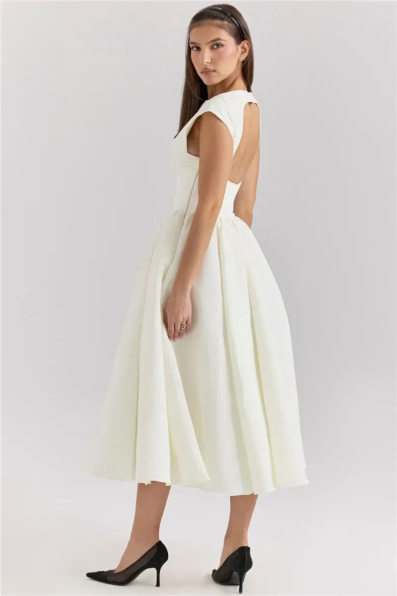 Vestido Elegante con Manga Capa y Espalda Descubierta
