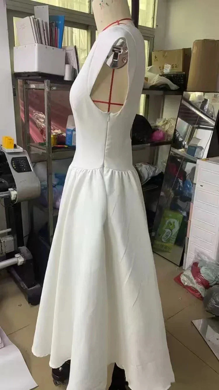 Vestido Elegante con Manga Capa y Espalda Descubierta