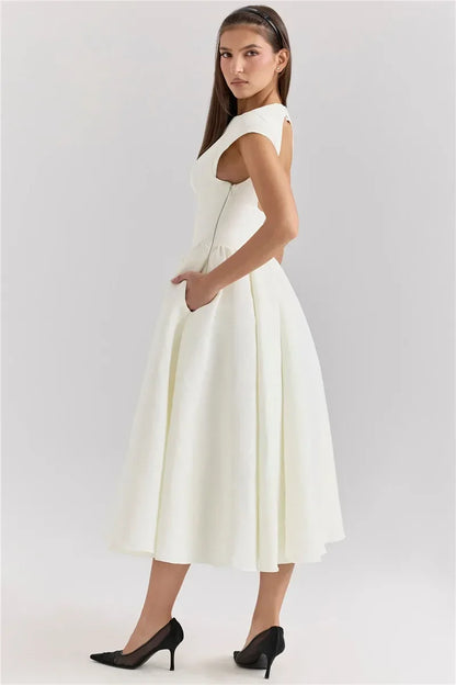 Vestido Elegante con Manga Capa y Espalda Descubierta